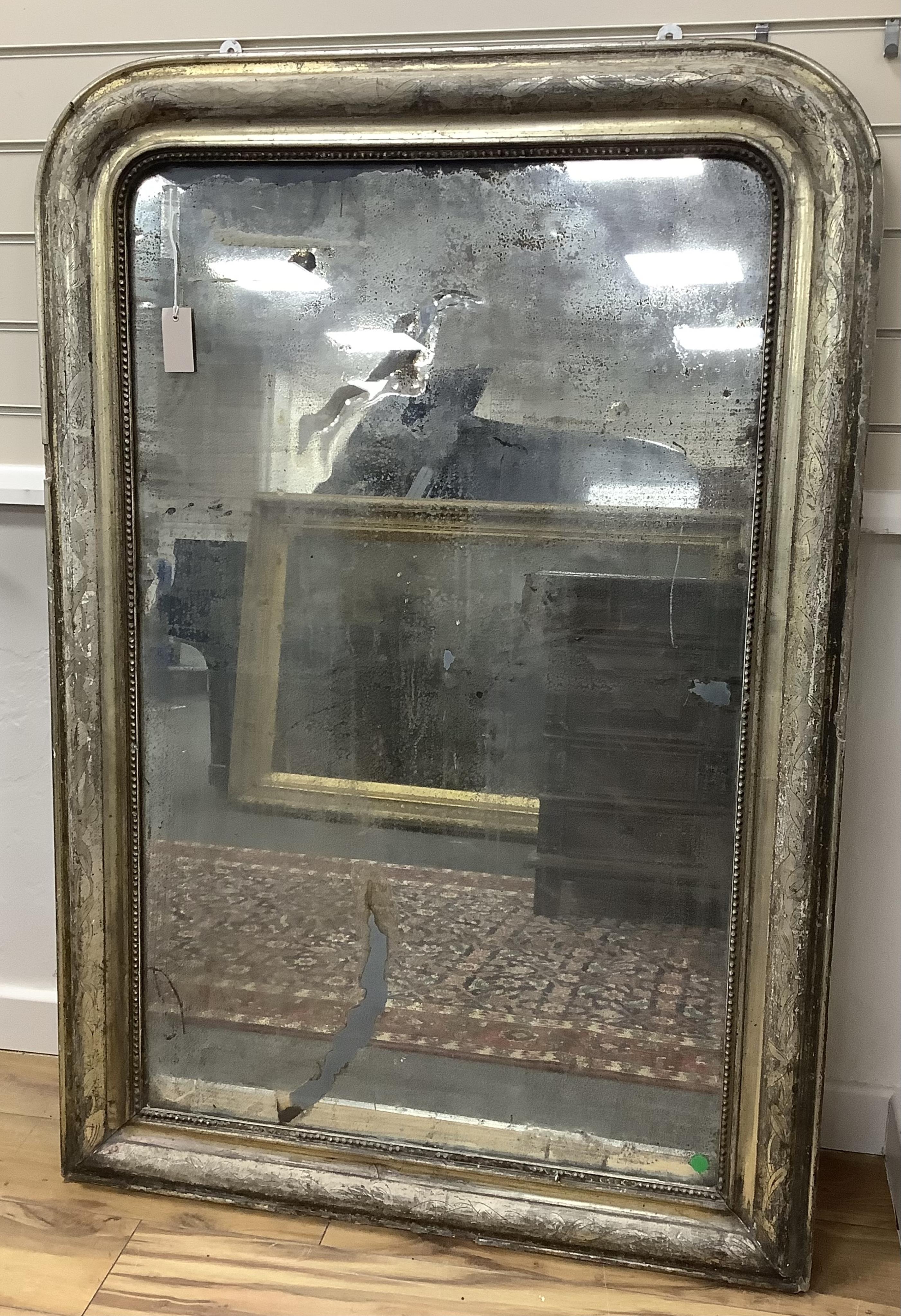 A 19th century French giltwood and composition overmantel mirror, width 92cm, height 135cm. Condition - poor to fair